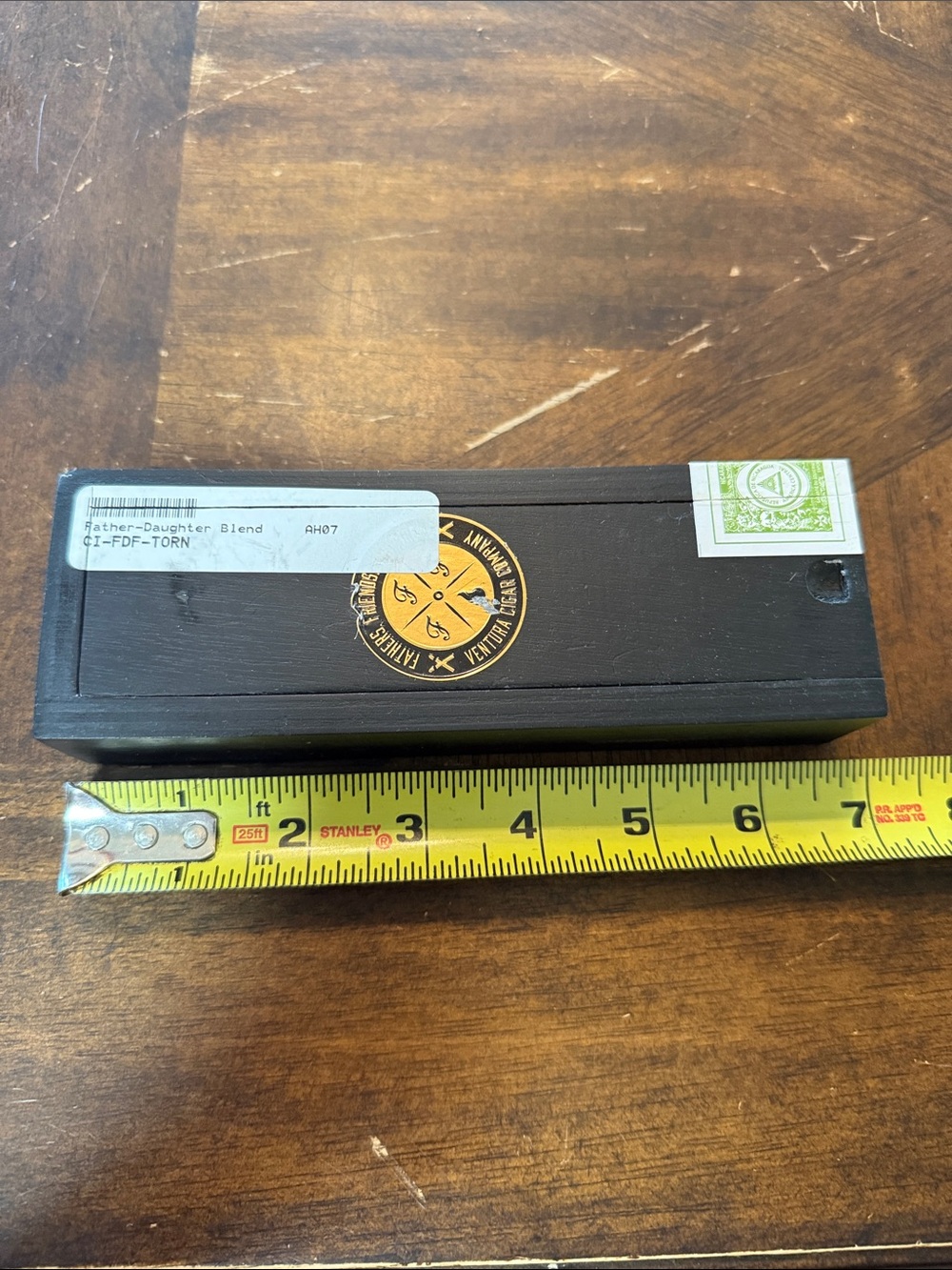 Empty Wooden Cigar Humidor Box with Gold Emblem in used condition